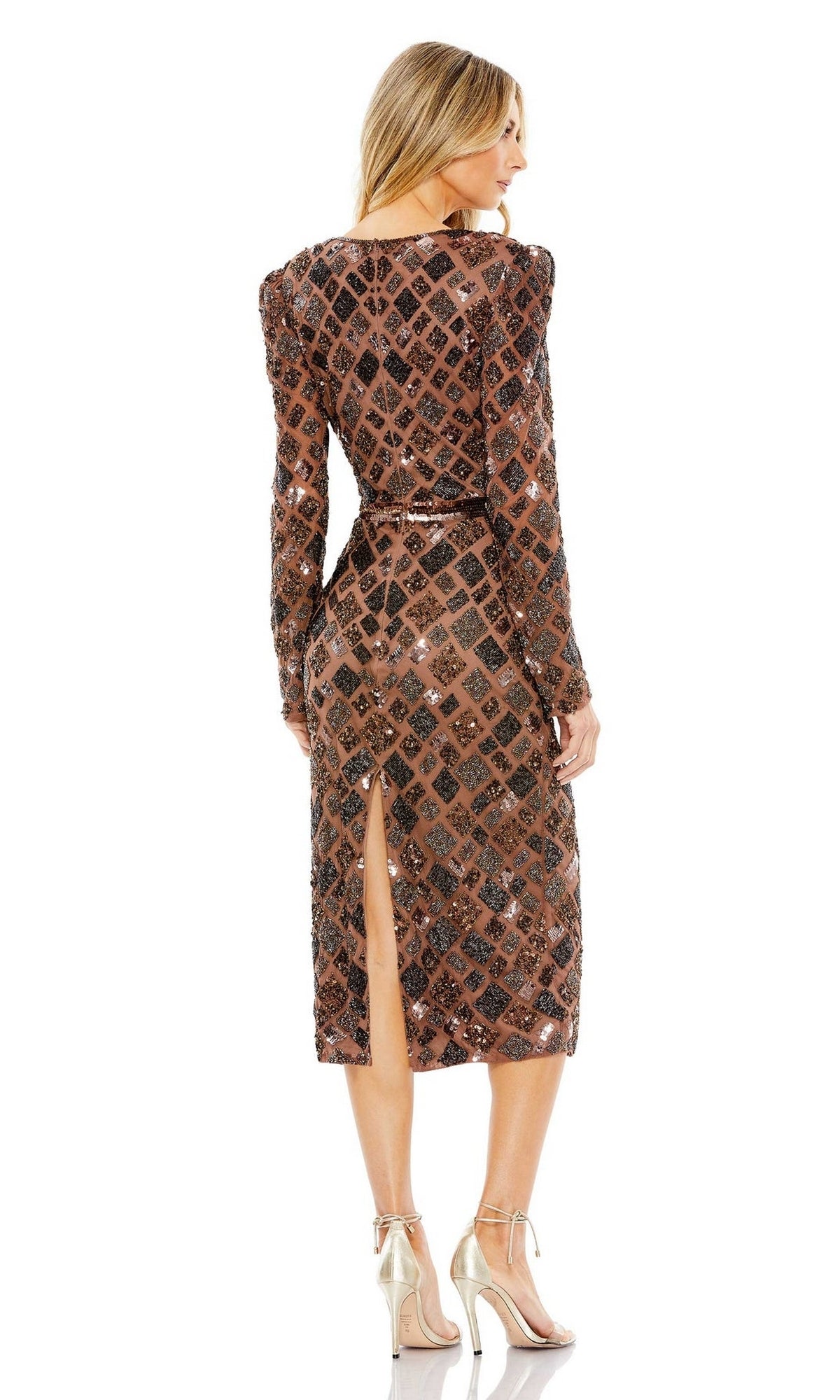 A woman faces away, wearing the Short Semi-Formal Dress 5472 by Mac Duggal—a chocolate brown sequin midi sheath with long sleeves and a back slit—paired with metallic high-heeled sandals.